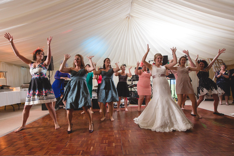 Dance by the hen party girls! At home Pembrokeshire wedding by Whole Picture Weddings